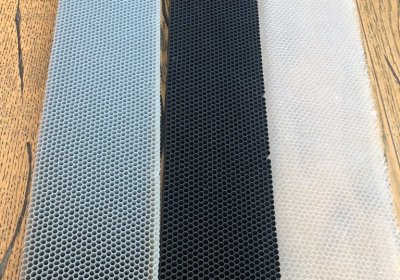 Round-Cell PC Honeycomb vs. Hexagonal PVC Core： Which Works Better for Display Cabinet Air Guide Strips? 